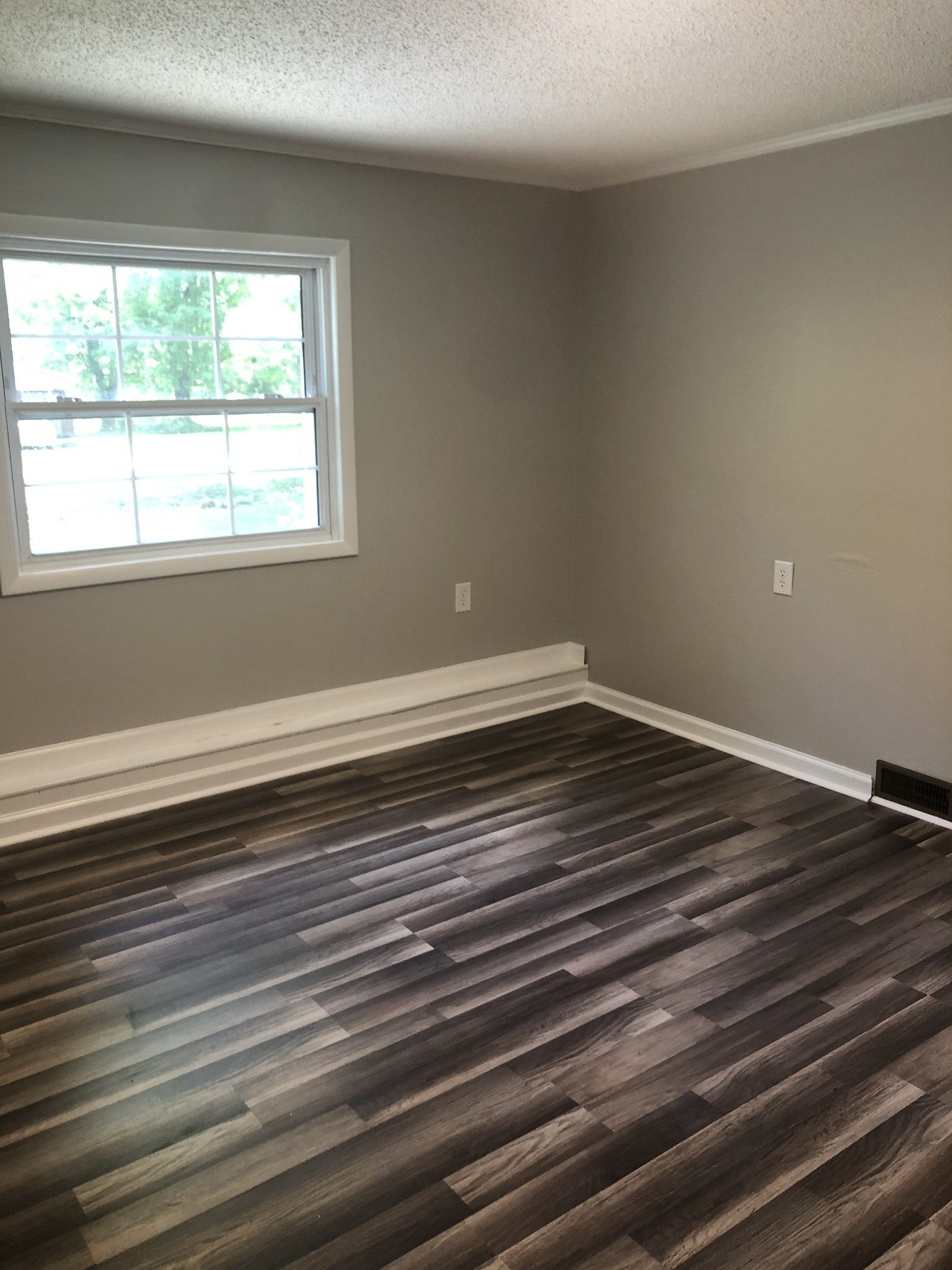 421 Oakwood Road Tullahoma, TN 37388 - Photo 8 of 13 a view of wooden floor with window