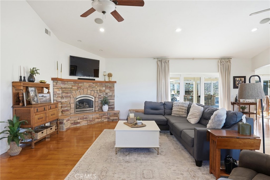 220 Cook Court Templeton, CA 93465 - Photo 8 of 45 a living room with furniture a fireplace and a flat screen tv