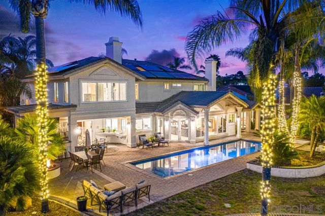 a front view of a house with a ocean view
