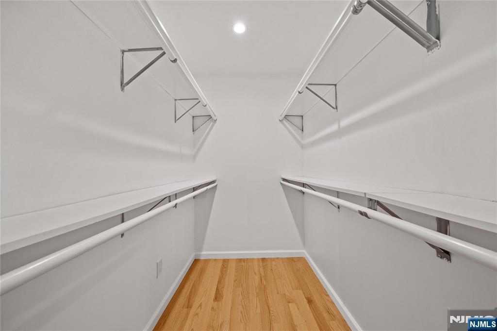 81 Fairmount Avenue Hackensack, NJ 07601 - Photo 14 of 19 a view of closet with wooden floor