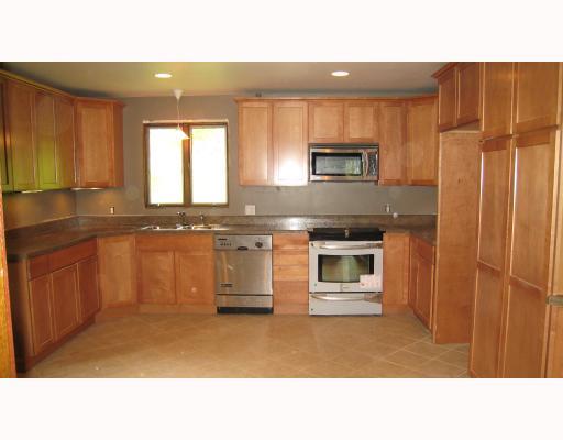 112 Powder Mill Road Renfrew, PA 16053 - Photo 2 of 8 Kitchen. Brand new maple finish kitchen w/upgraded stainless steel appliances, under cabinet lighting, and ceramic tile laid on the diagonal..