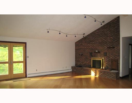 112 Powder Mill Road Renfrew, PA 16053 - Photo 3 of 8 Den/Family/Great Room. Dramatic family room w/bamboo floors, vaulted ceiling, brick fireplace, and 2 sets of french doors.