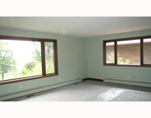 112 Powder Mill Road Renfrew, PA 16053 - Photo 4 of 8 Living Room. Living room with 2 large picture windows. All new carpet on first floor.