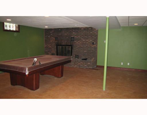 112 Powder Mill Road Renfrew, PA 16053 - Photo 5 of 8 Den/Family/Great Room. Huge game room with 2nd brick firepace, cork floors. Pool table stays.