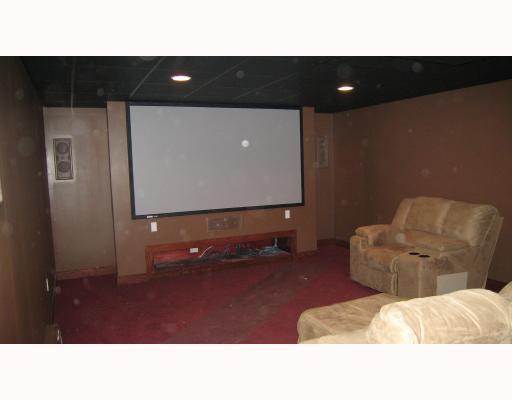 112 Powder Mill Road Renfrew, PA 16053 - Photo 6 of 8 Den/Family/Great Room. Custom designed Theater room w/sound deadening insulation, 7 in-wall speakers. Theater seating, screen and projector stays!
