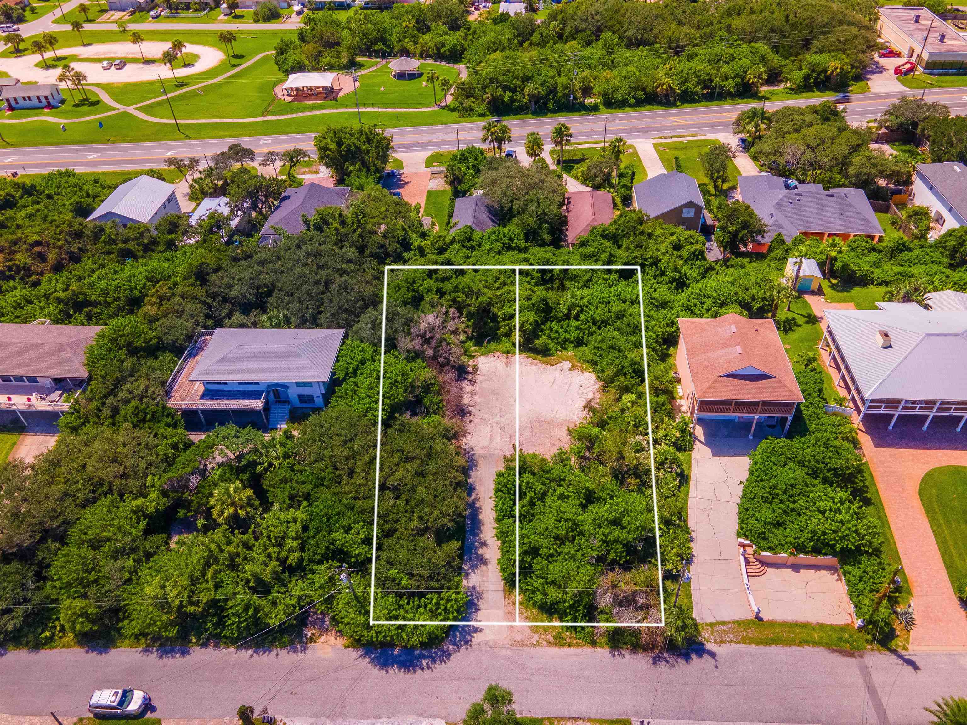 5343 Pelican Way St. Augustine, FL 32080 - Photo 3 of 13 Aerial view of residential area featuring a tree filled landscape