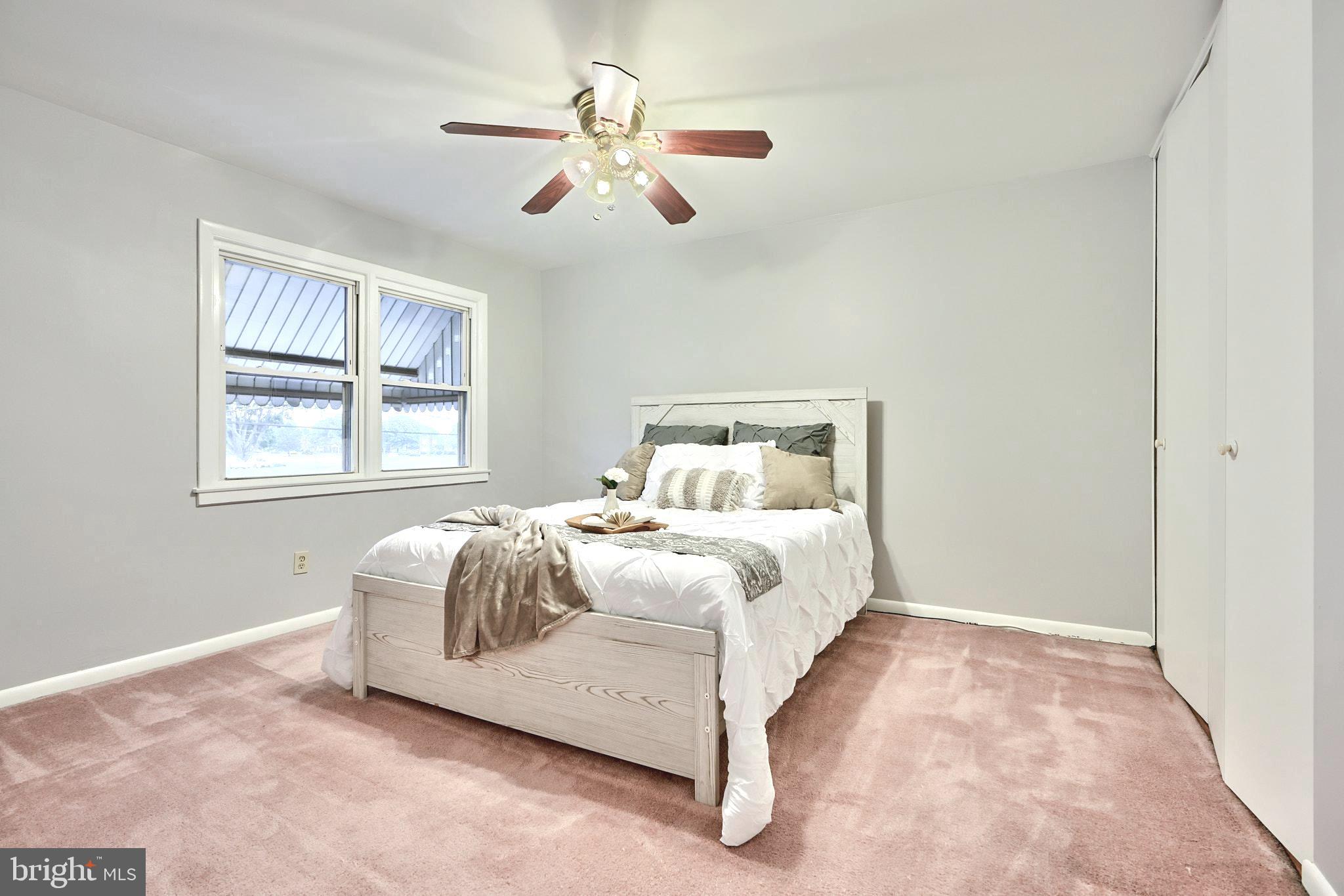 1718 Stokesley Road Dundalk, MD 21222 - Photo 18 of 44 SPACIOUS BEDROOM 1 , QUEEN BED SHOWN (UPPER LVL)