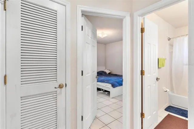 a view of a bedroom from a hallway