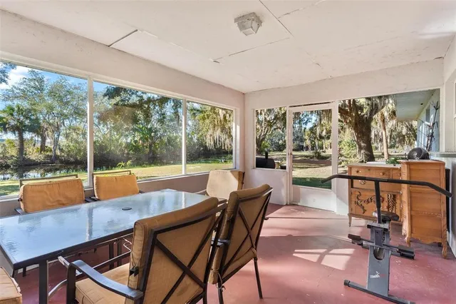 a view of a city from a dining room with a large window