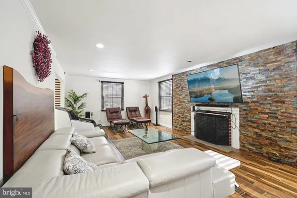 a stove top oven sitting inside of a kitchen