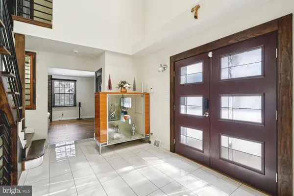 a bed room with furniture and a window