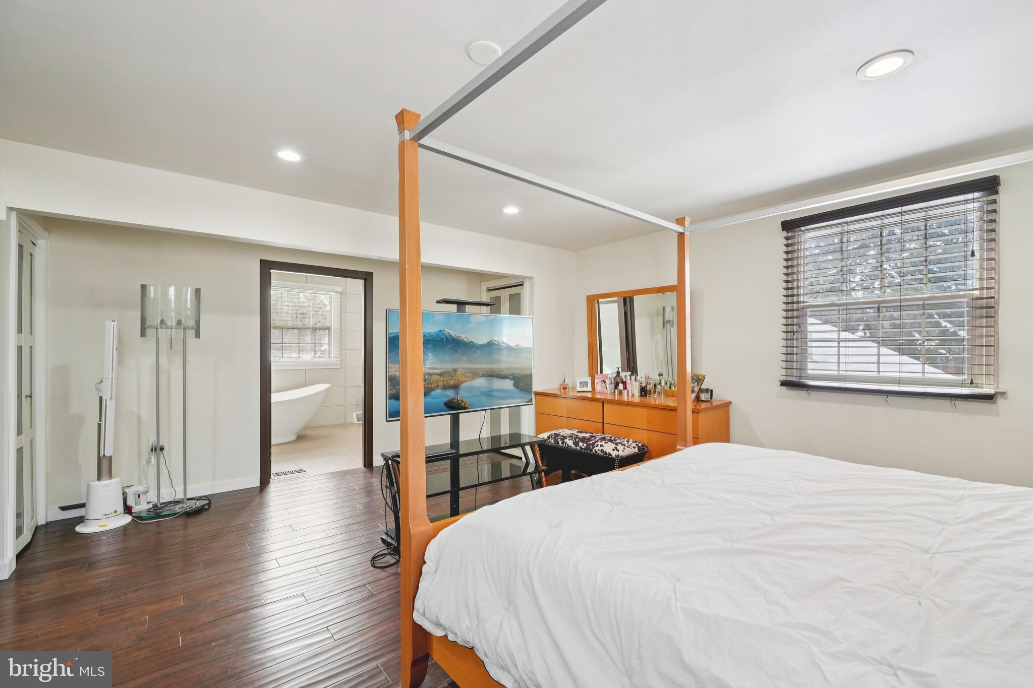 700 Campwoods Road Villanova, PA 19085 - Photo 22 of 72 a bedroom with a bed and wooden floor