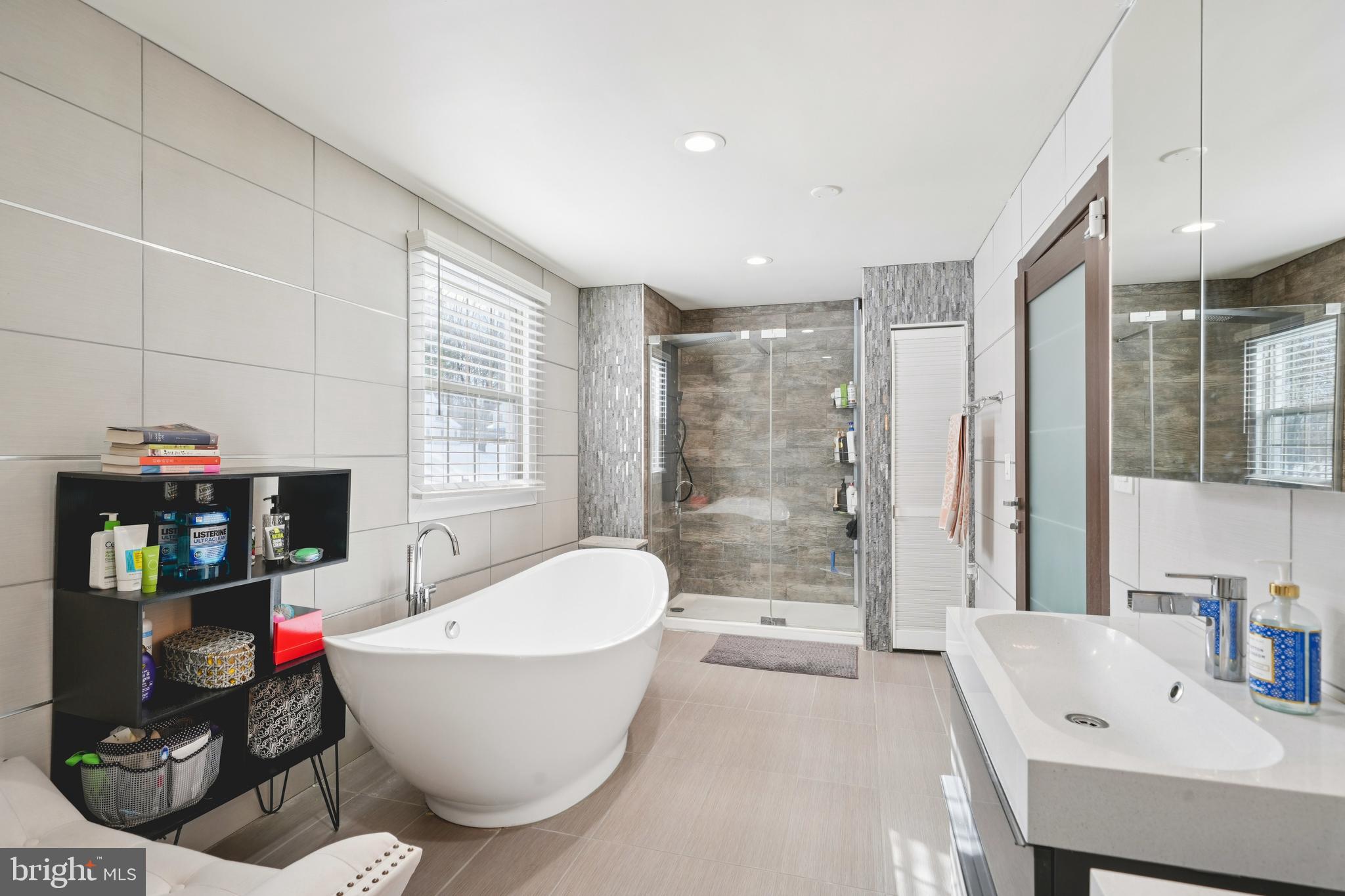 700 Campwoods Road Villanova, PA 19085 - Photo 24 of 72 a bathroom with a bathtub and a sink