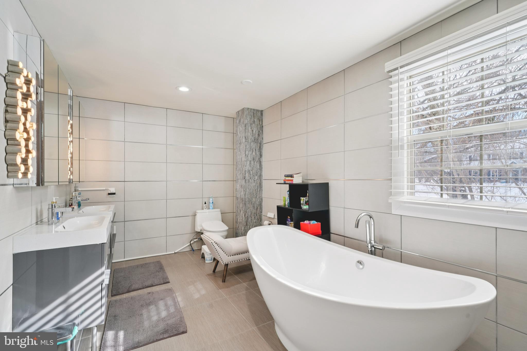 700 Campwoods Road Villanova, PA 19085 - Photo 26 of 72 a bathroom with a sink and a bathtub