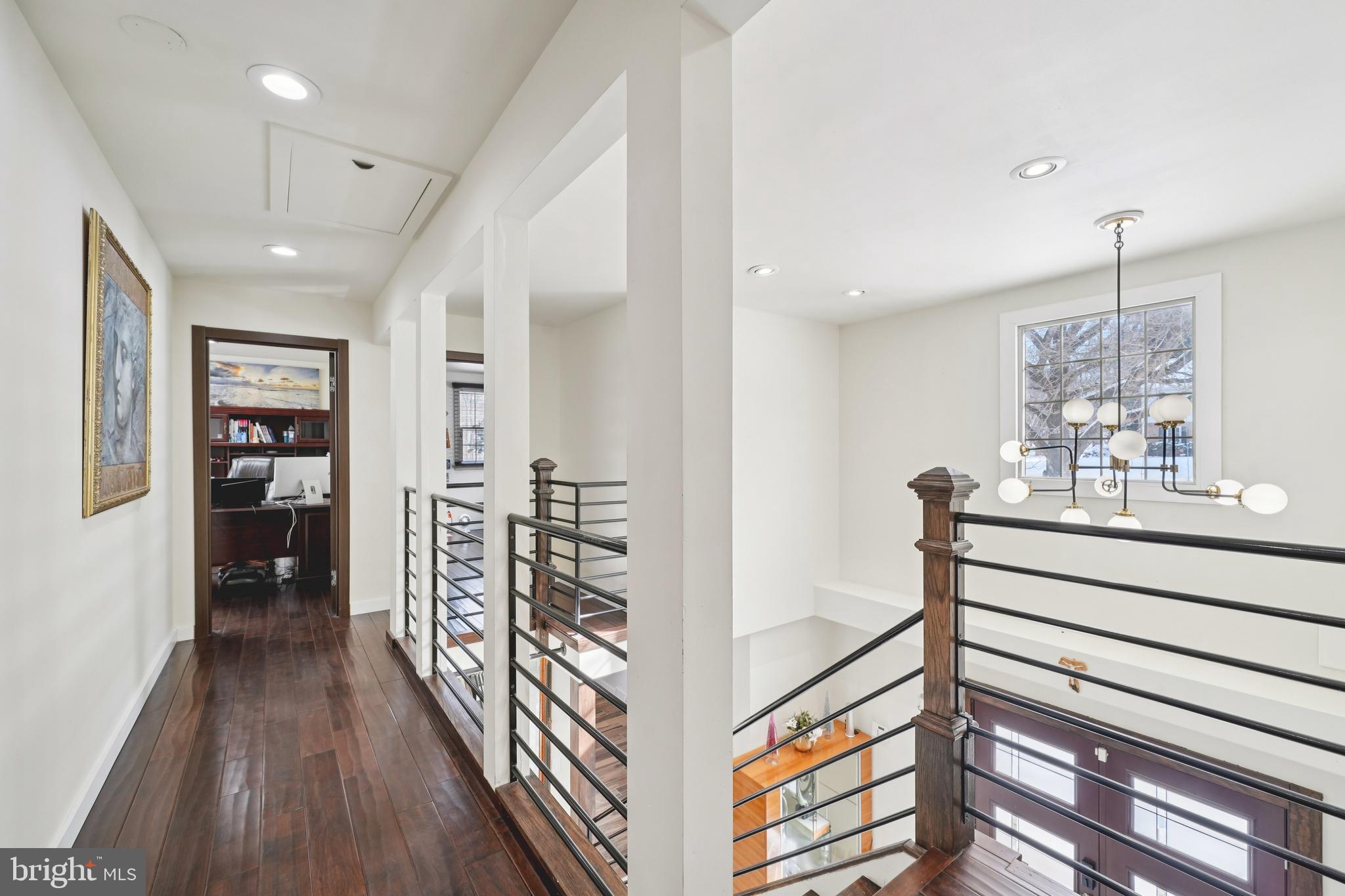 700 Campwoods Road Villanova, PA 19085 - Photo 33 of 72 a view of a hallway with wooden floor and staircase