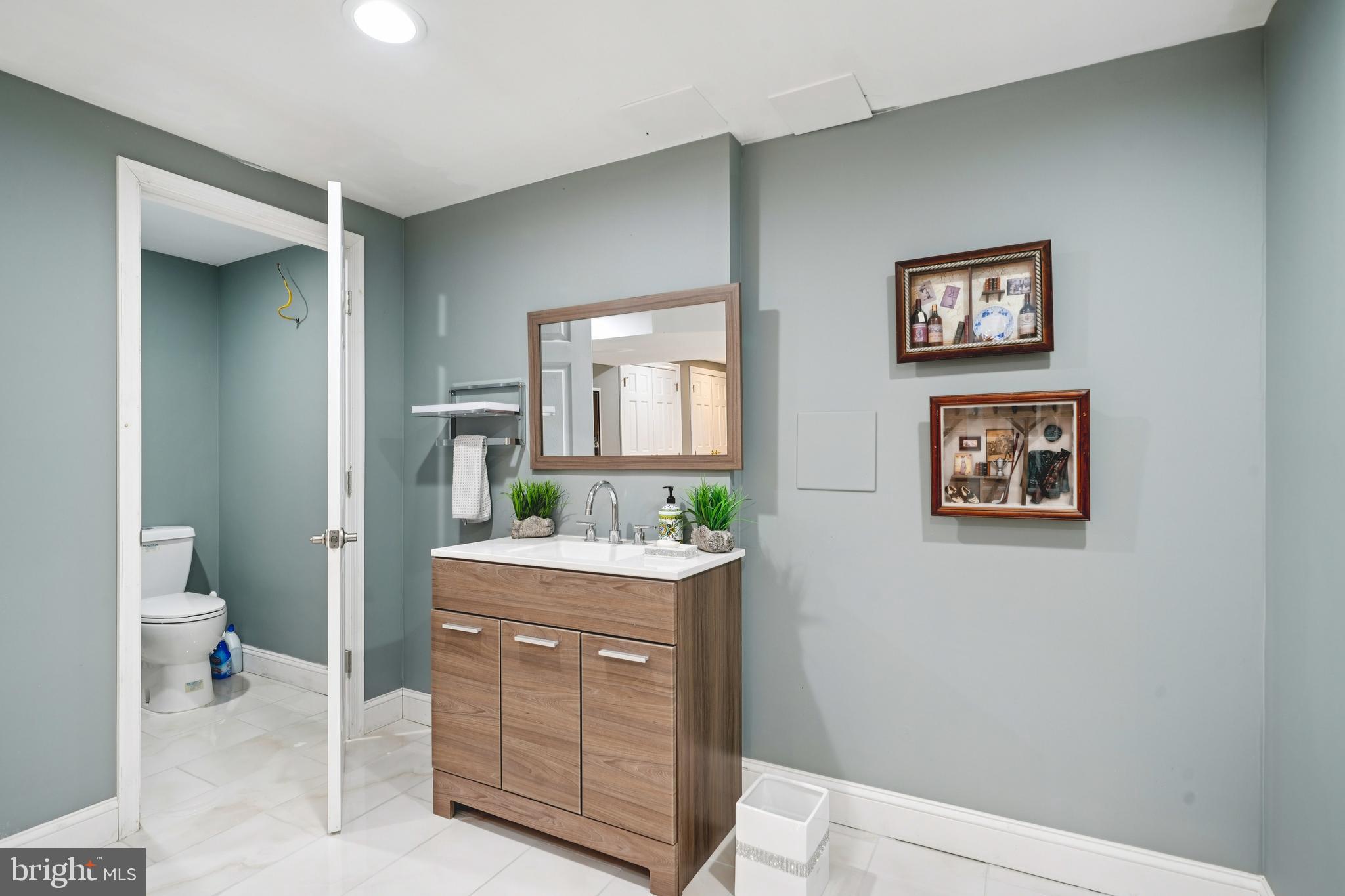 700 Campwoods Road Villanova, PA 19085 - Photo 45 of 72 a room with a toilet and a view of bathroom