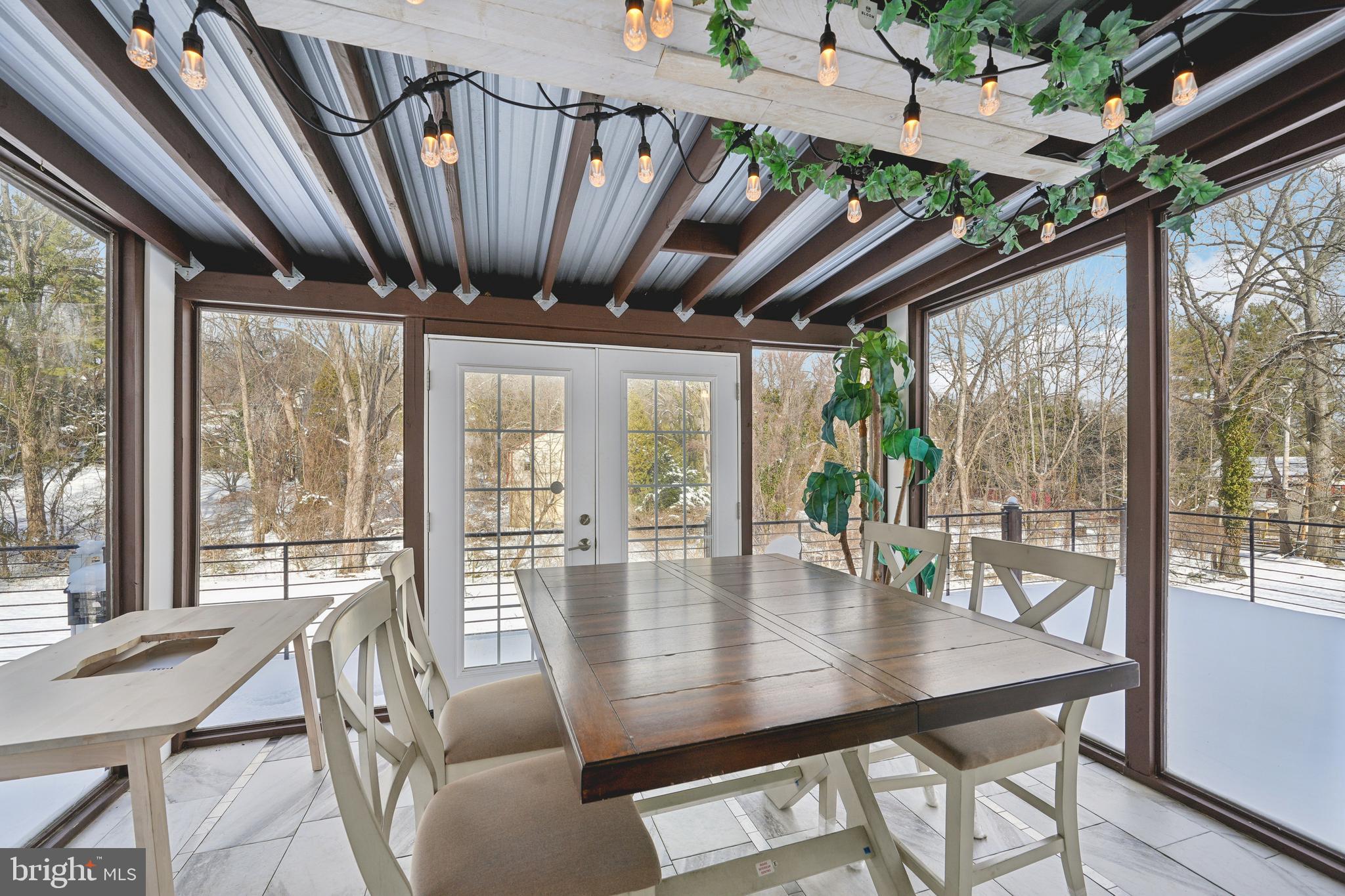 700 Campwoods Road Villanova, PA 19085 - Photo 49 of 72 a view of a dining room with furniture wooden floor and a potted plant