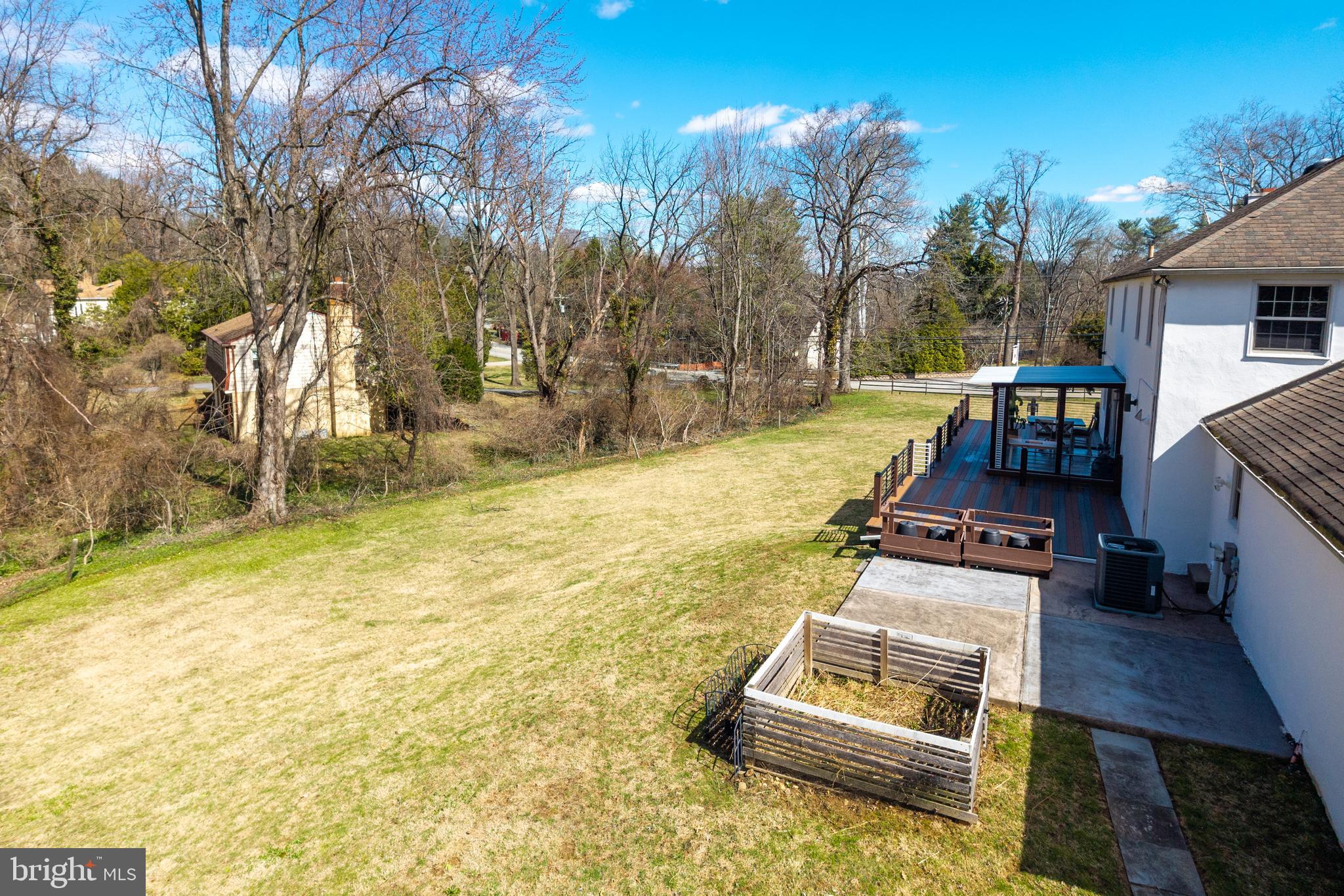 700 Campwoods Road Villanova, PA 19085 - Photo 55 of 72 a small pool with some trees in the background