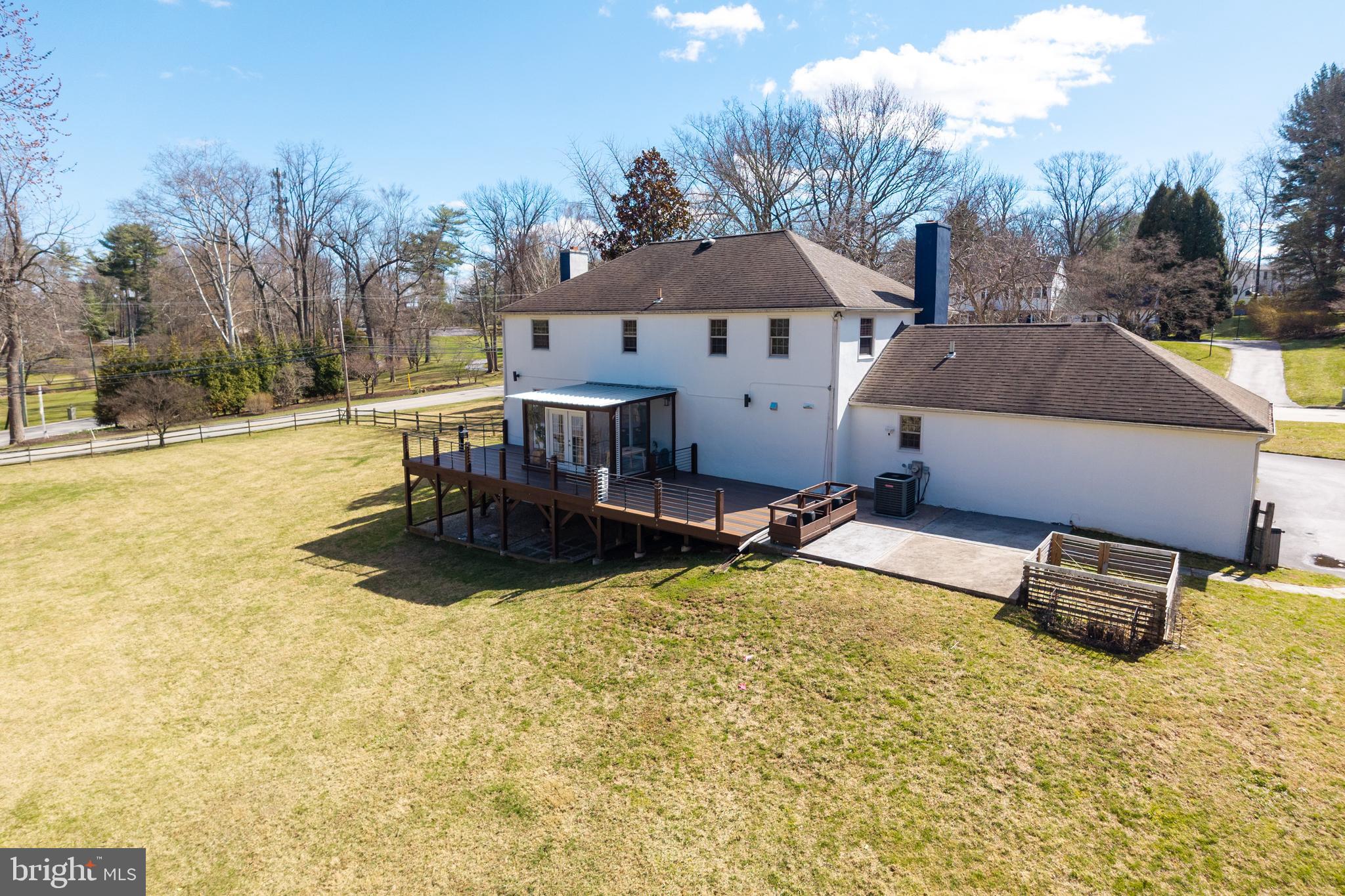 700 Campwoods Road Villanova, PA 19085 - Photo 56 of 72 a view of a house with pool and sitting area