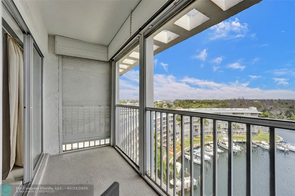 1523 East Hillsboro Boulevard, Unit 1031 Deerfield Beach, FL 33441 - Photo 40 of 78 a view of a city from a balcony