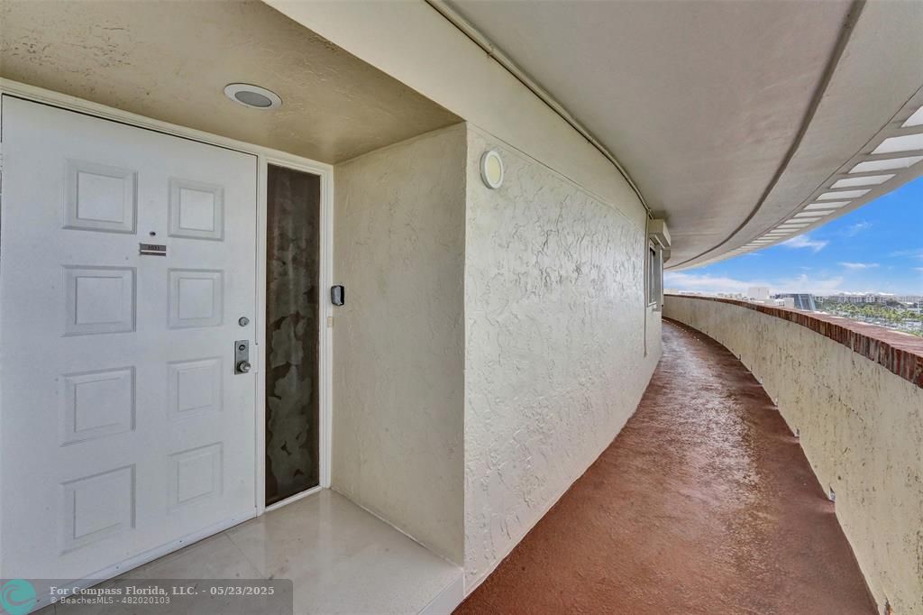 1523 East Hillsboro Boulevard, Unit 1031 Deerfield Beach, FL 33441 - Photo 58 of 78 a view of a hallway with closet