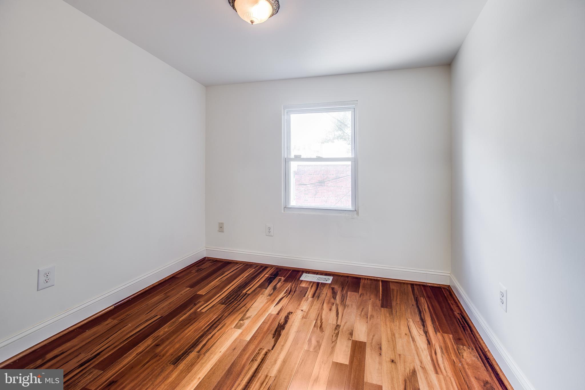 729 10th Street Northeast Washington, DC 20002 - Photo 14 of 20 an empty room with a window