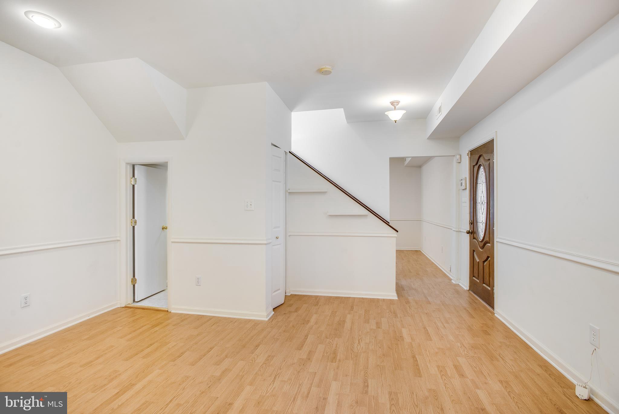 729 10th Street Northeast Washington, DC 20002 - Photo 3 of 20 a view of an empty room with wooden floor