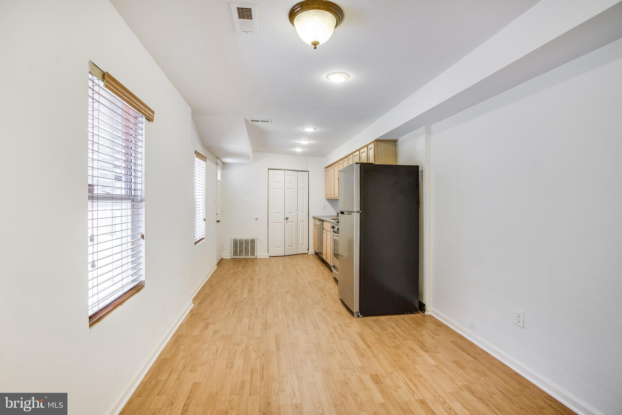 729 10th Street Northeast Washington, DC 20002 - Photo 5 of 20 a view of a livingroom with wooden floor