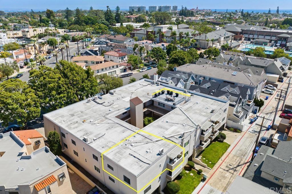 an aerial view of a house with a big yard