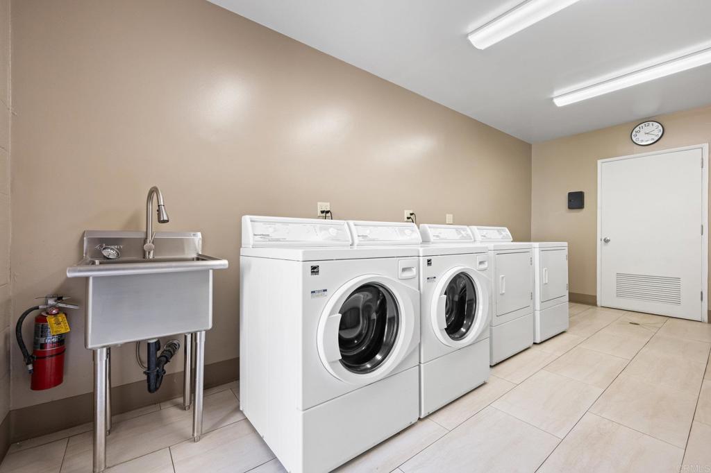 528 E Avenue Coronado, CA 92118 - Photo 16 of 19 a utility room with dryer and washer
