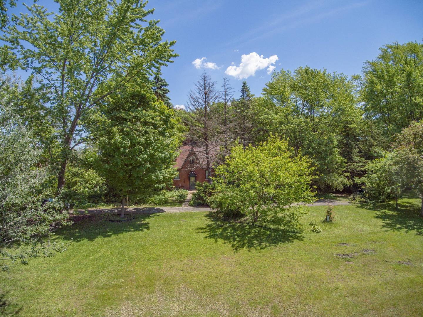 2331 West Palatine Road Palatine, IL 60067 - Photo 11 of 19 a view of a lake with a building in the background