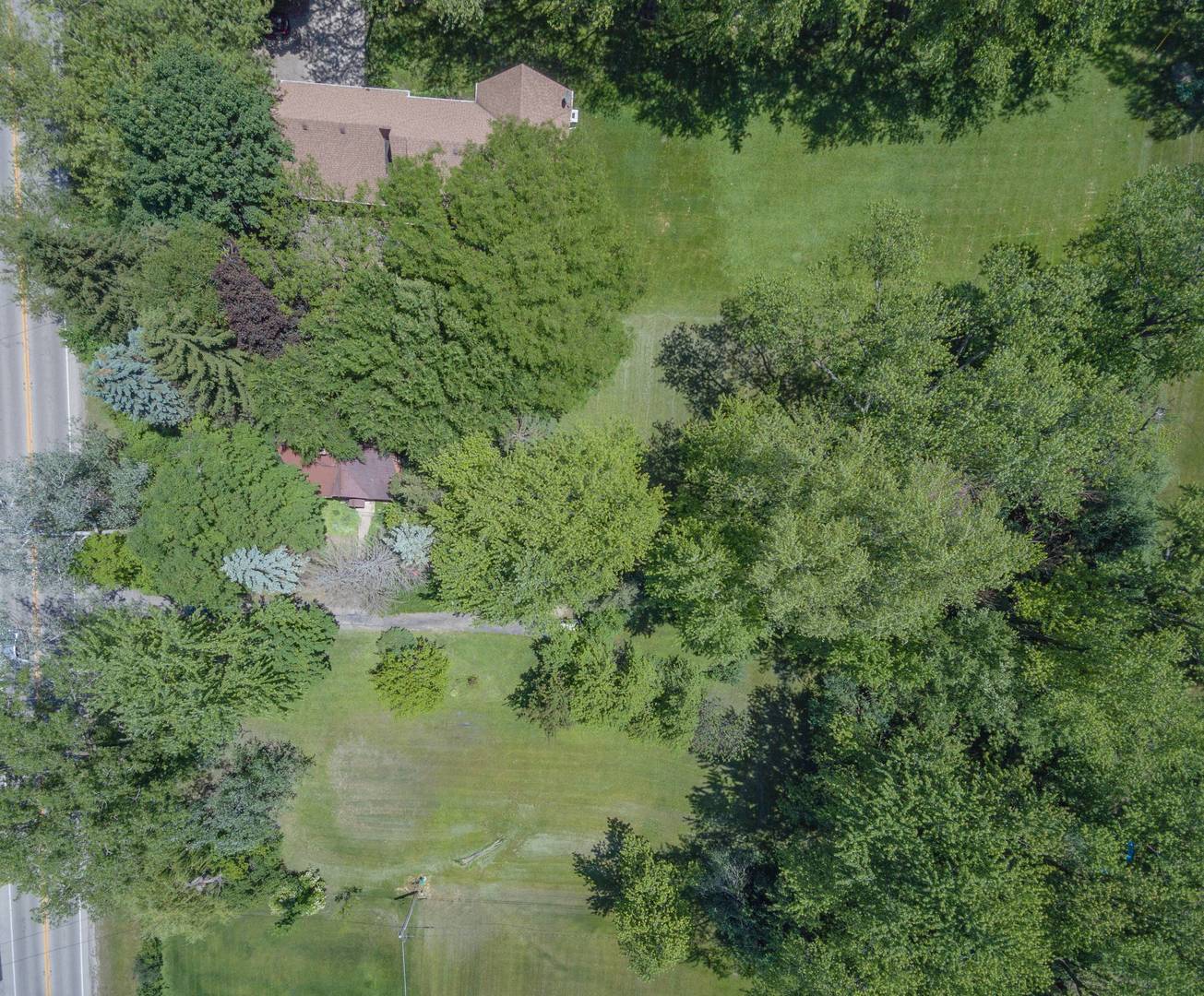 2331 West Palatine Road Palatine, IL 60067 - Photo 12 of 19 an aerial view of residential house with outdoor space and trees all around
