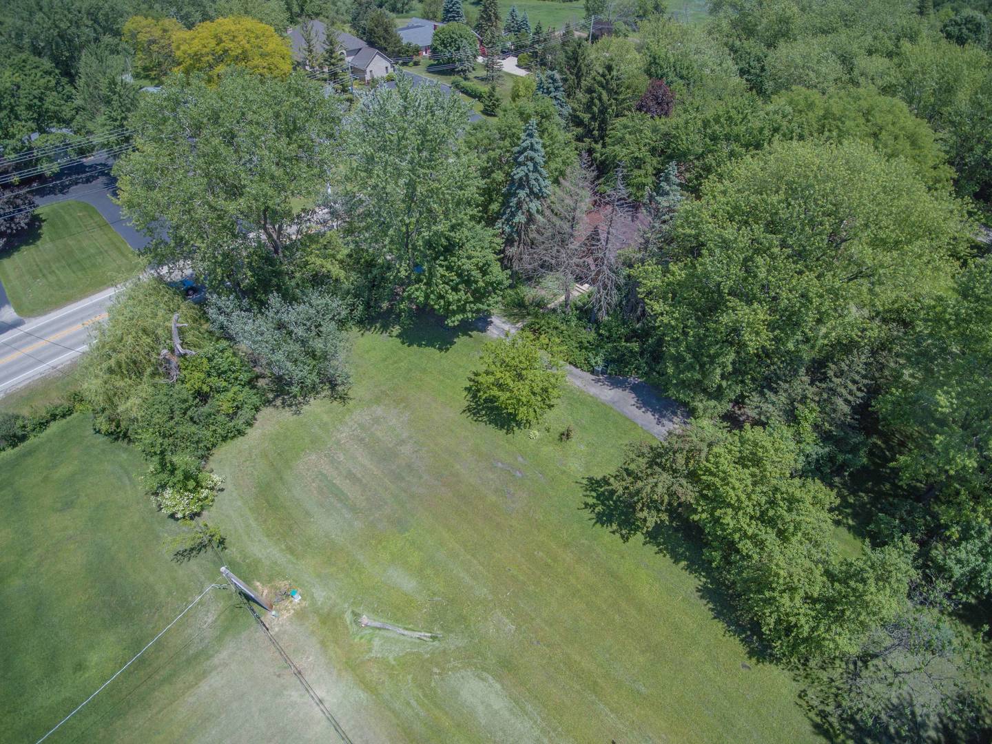 2331 West Palatine Road Palatine, IL 60067 - Photo 13 of 19 an aerial view of residential house with outdoor space and trees all around