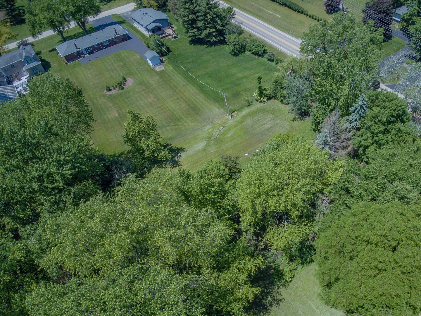 2331 West Palatine Road Palatine, IL 60067 - Photo 15 of 19 an aerial view of residential house with outdoor space and trees all around