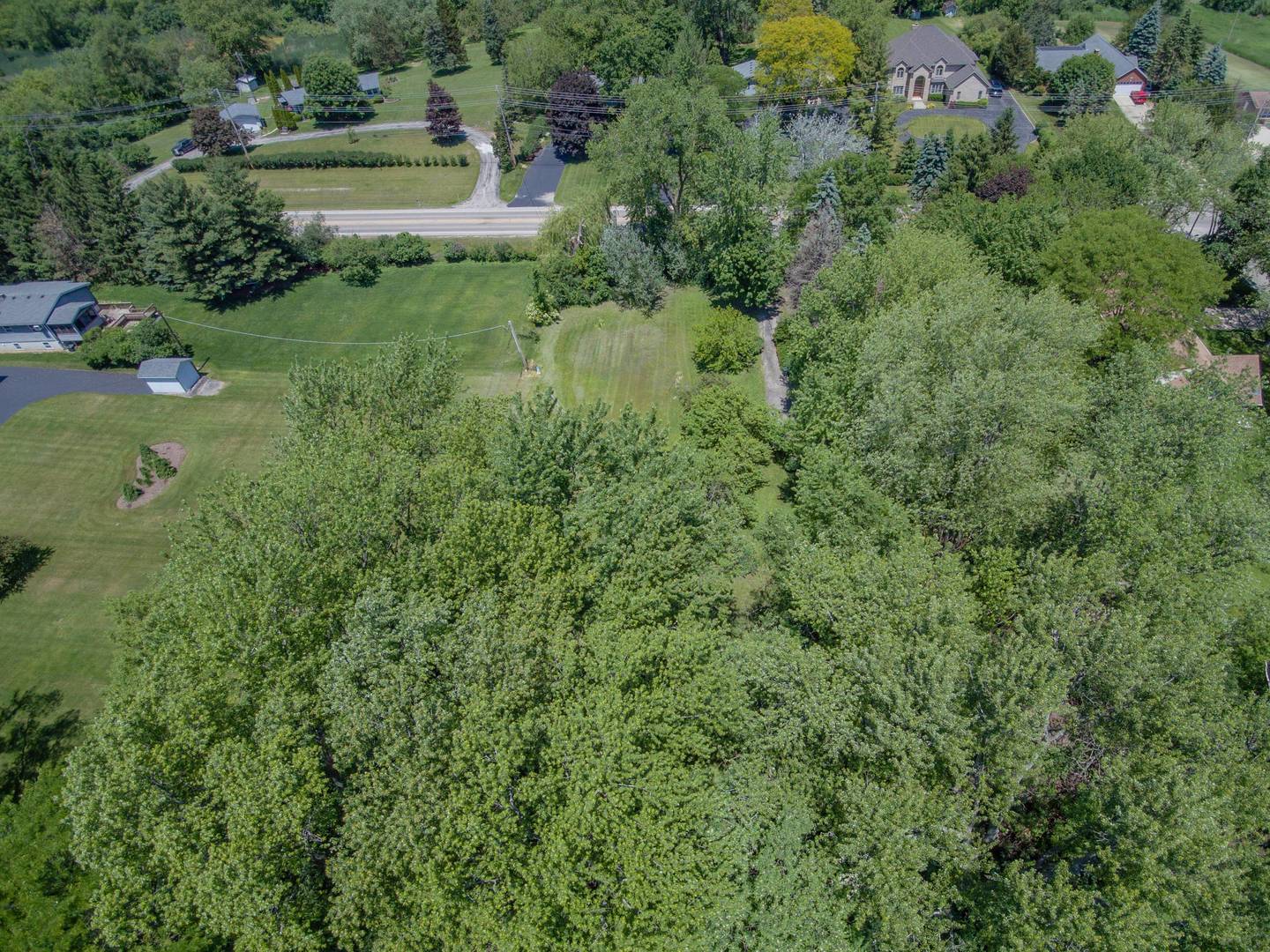 2331 West Palatine Road Palatine, IL 60067 - Photo 16 of 19 a view of a garden with a fountain