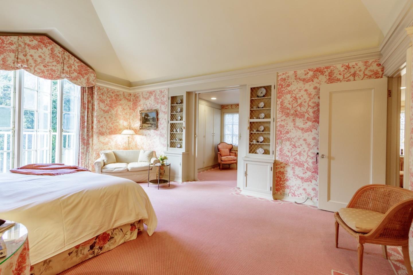 290 Richmond Road Hillsborough, CA 94010 - Photo 10 of 24 a bedroom with a bed and a chair