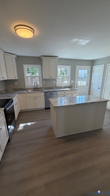 1424 Decatur Street Richmond, VA 23224 - Photo 8 of 28 Kitchen featuring white cabinetry, light-toned cou