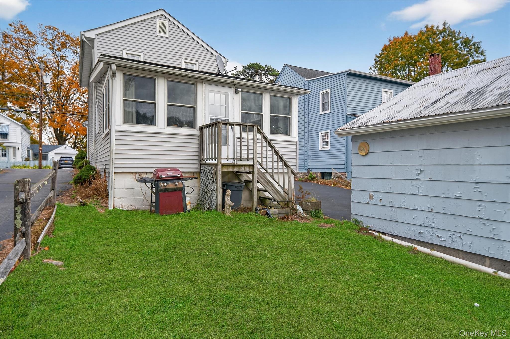 157 Stage Road Monroe, NY 10950 - Photo 19 of 23 a view of a house with a yard and sitting area