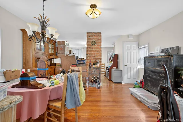 a living room with lots of furniture and a window