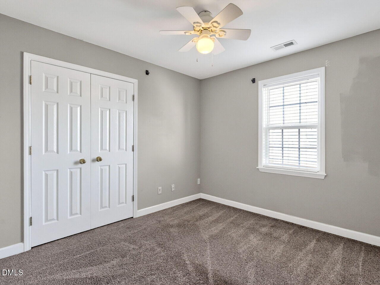 4500 Rivershyre Way Raleigh, NC 27616 - Photo 32 of 42 a view of an empty room with a window