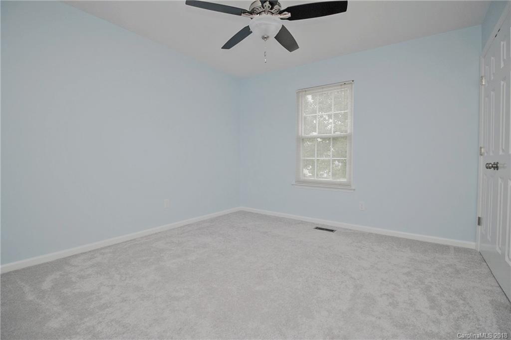 9331 Marshbrooke Road Charlotte, NC 28105 - Photo 15 of 20 a view of an empty room with a window