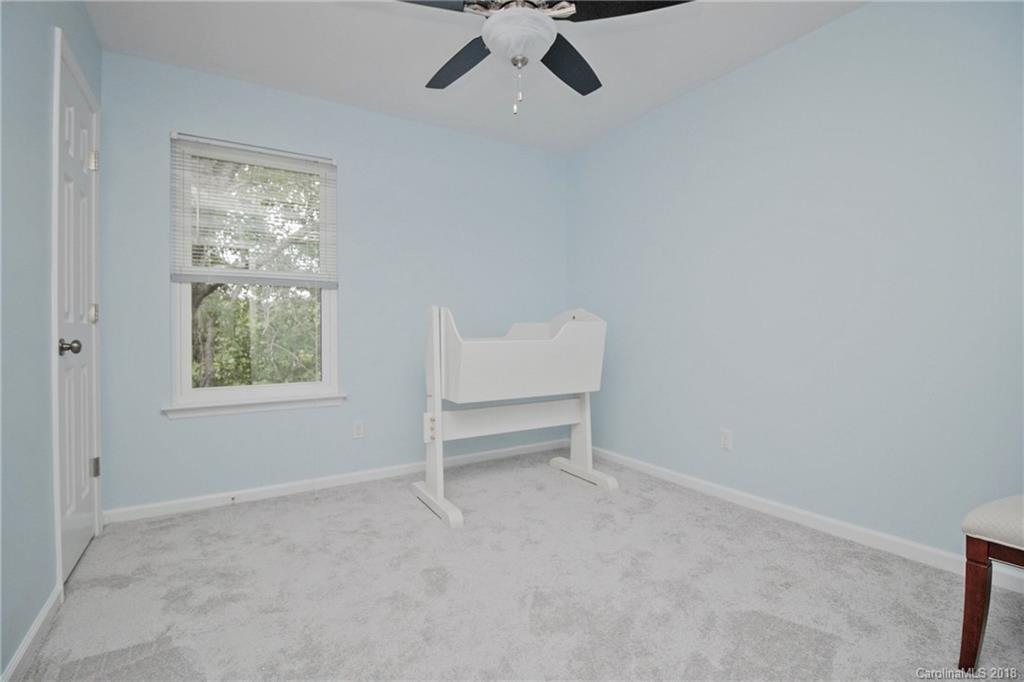 9331 Marshbrooke Road Charlotte, NC 28105 - Photo 16 of 20 an empty room with a window