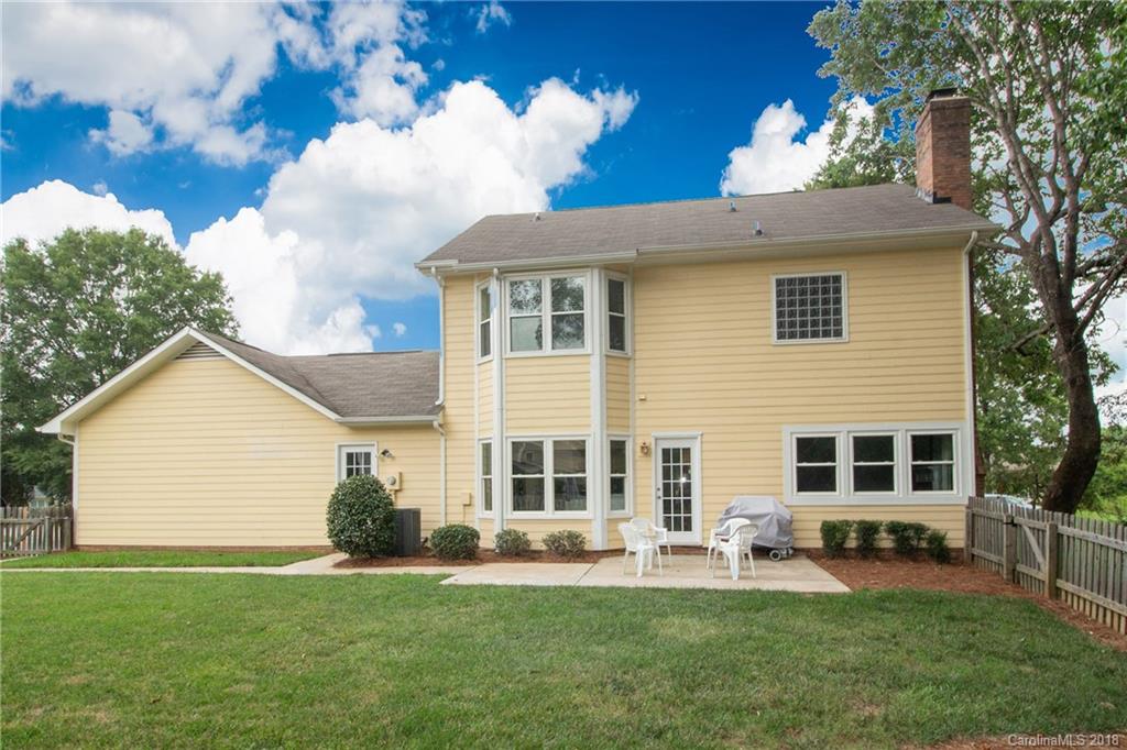 9331 Marshbrooke Road Charlotte, NC 28105 - Photo 19 of 20 front view of a house with a yard
