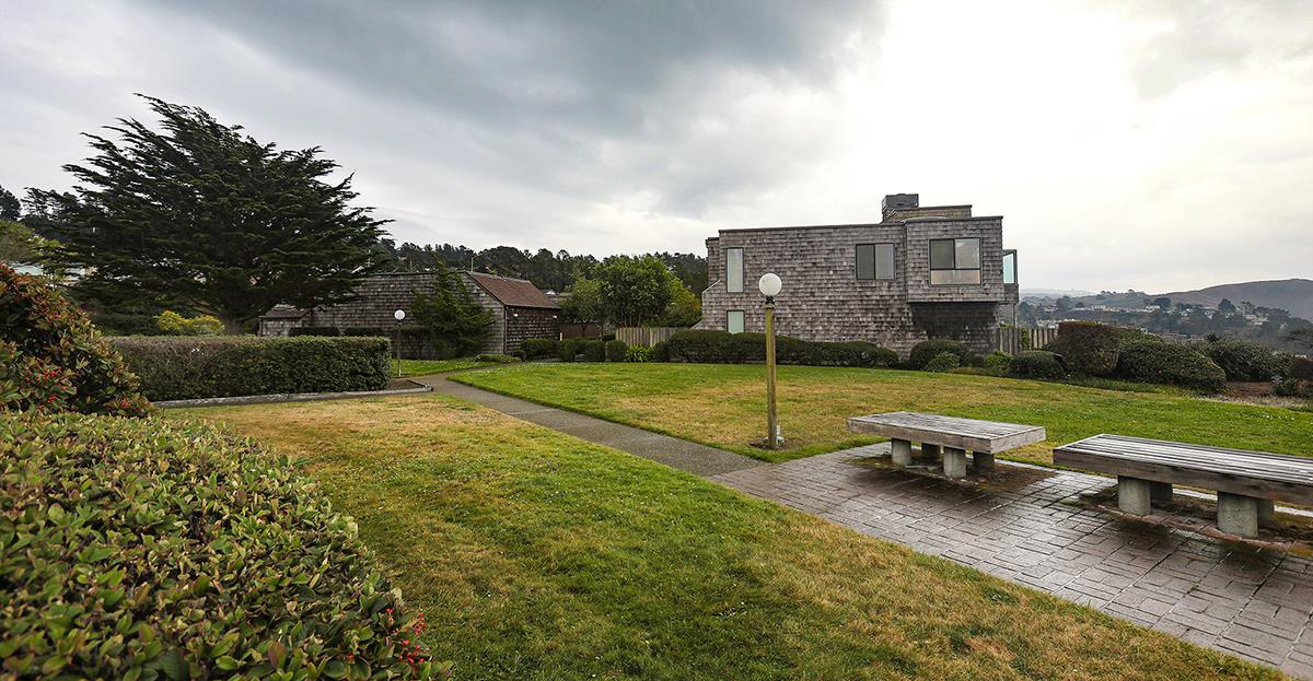 270 Beachview Avenue, Unit 14 Pacifica, CA 94044 - Photo 16 of 41 a view of a garden with lawn chairs