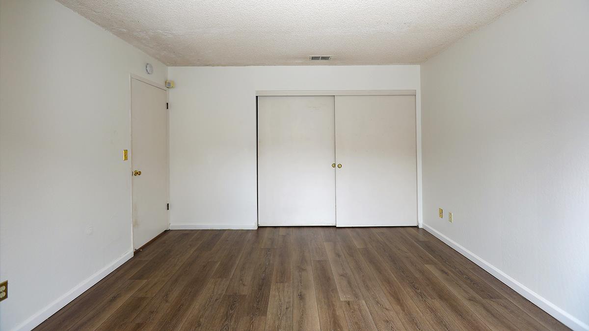 270 Beachview Avenue, Unit 14 Pacifica, CA 94044 - Photo 23 of 41 a view of room with wooden floor