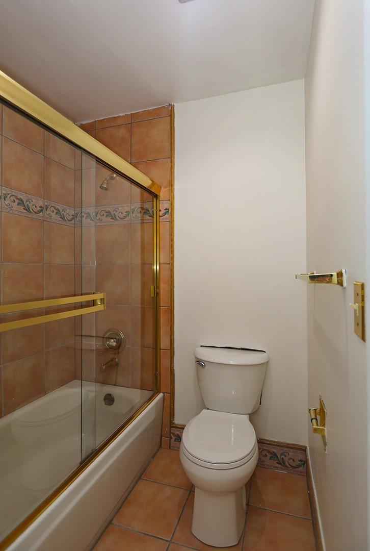 270 Beachview Avenue, Unit 14 Pacifica, CA 94044 - Photo 26 of 41 a bathroom with a toilet and a bathtub