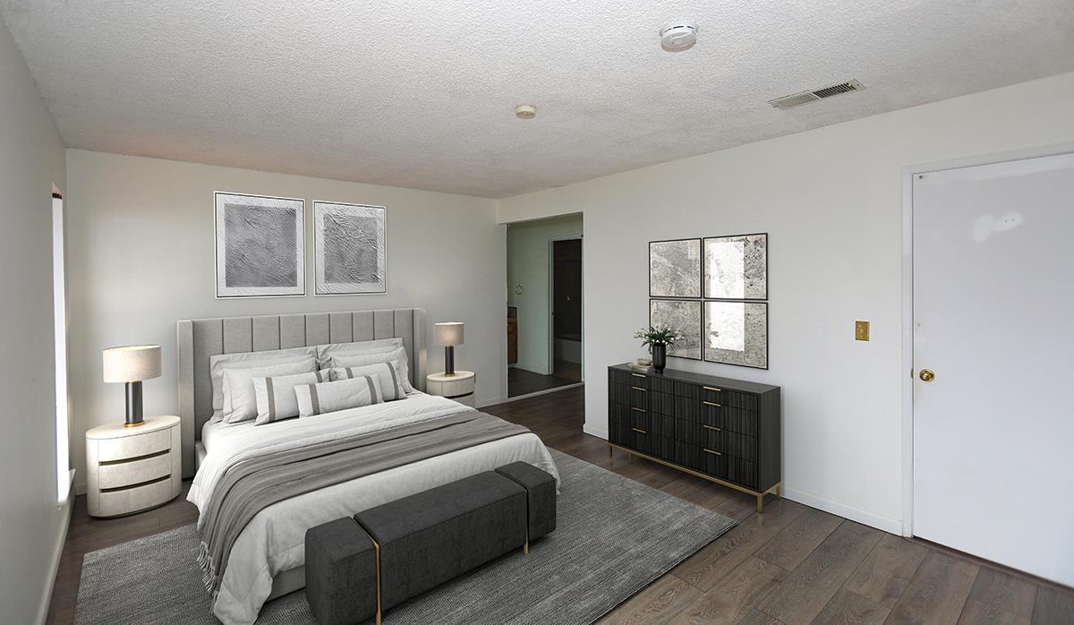 270 Beachview Avenue, Unit 14 Pacifica, CA 94044 - Photo 5 of 41 a bedroom with a bed and a dresser