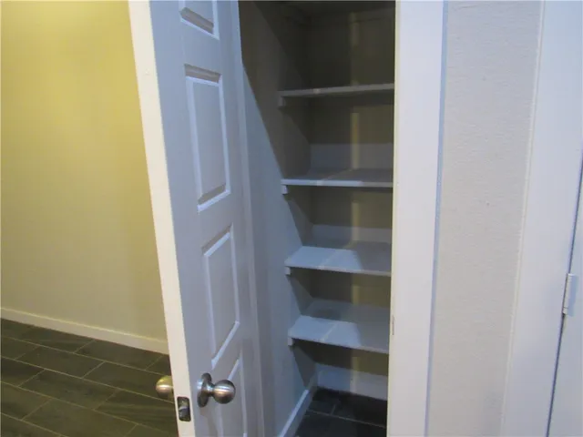 a kitchen with a sink and a stove