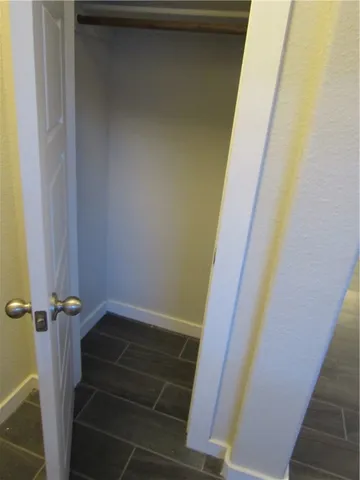 a kitchen with stainless steel appliances a refrigerator a sink a stove and microwave