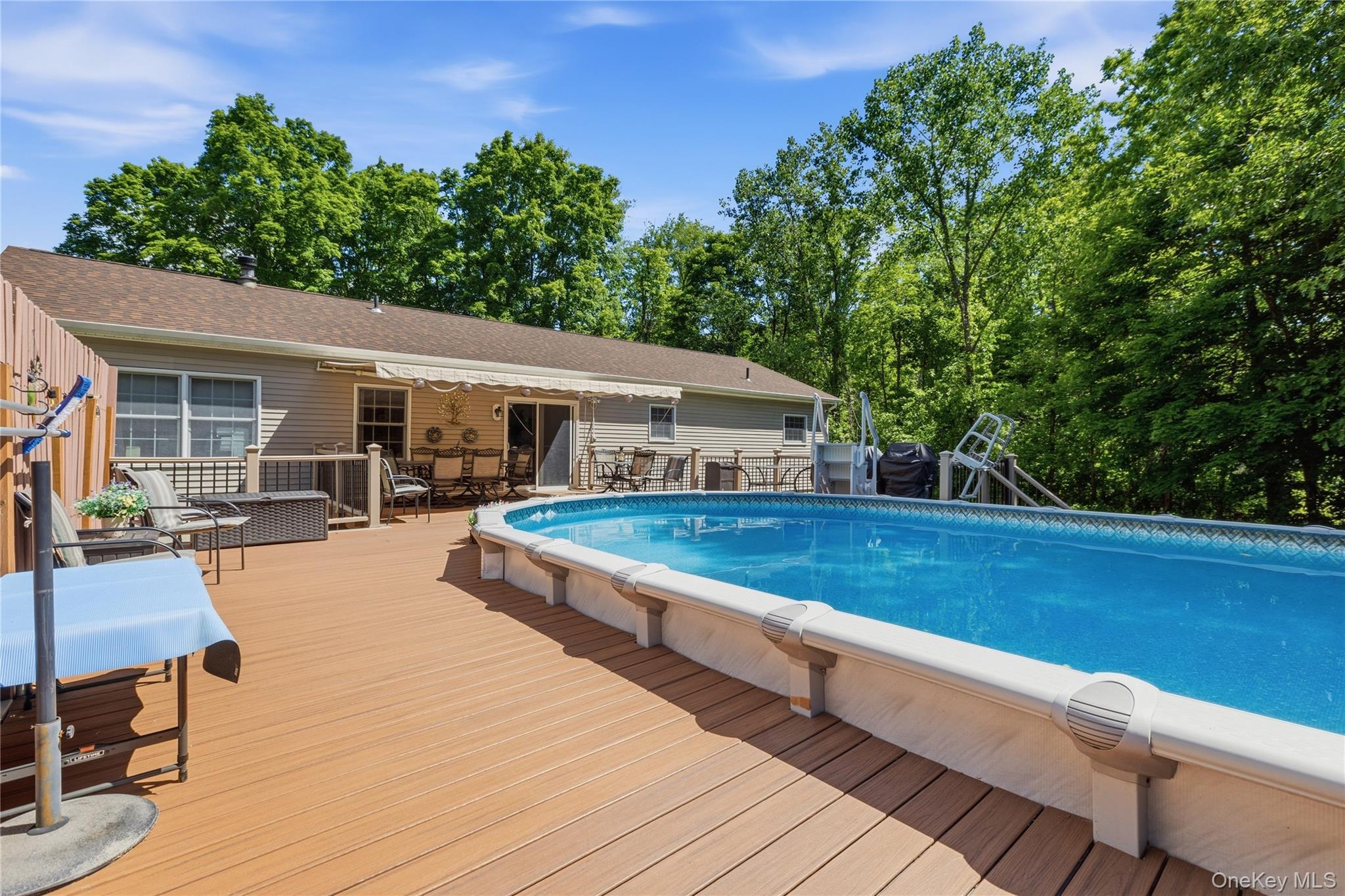 239-241 Fosler Road Highland, NY 12528 - Photo 23 of 42 Expansive wood-finish deck surrounding an above-ground pool